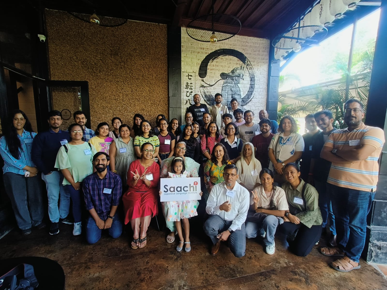 Saachi students and trainers at a group gathering